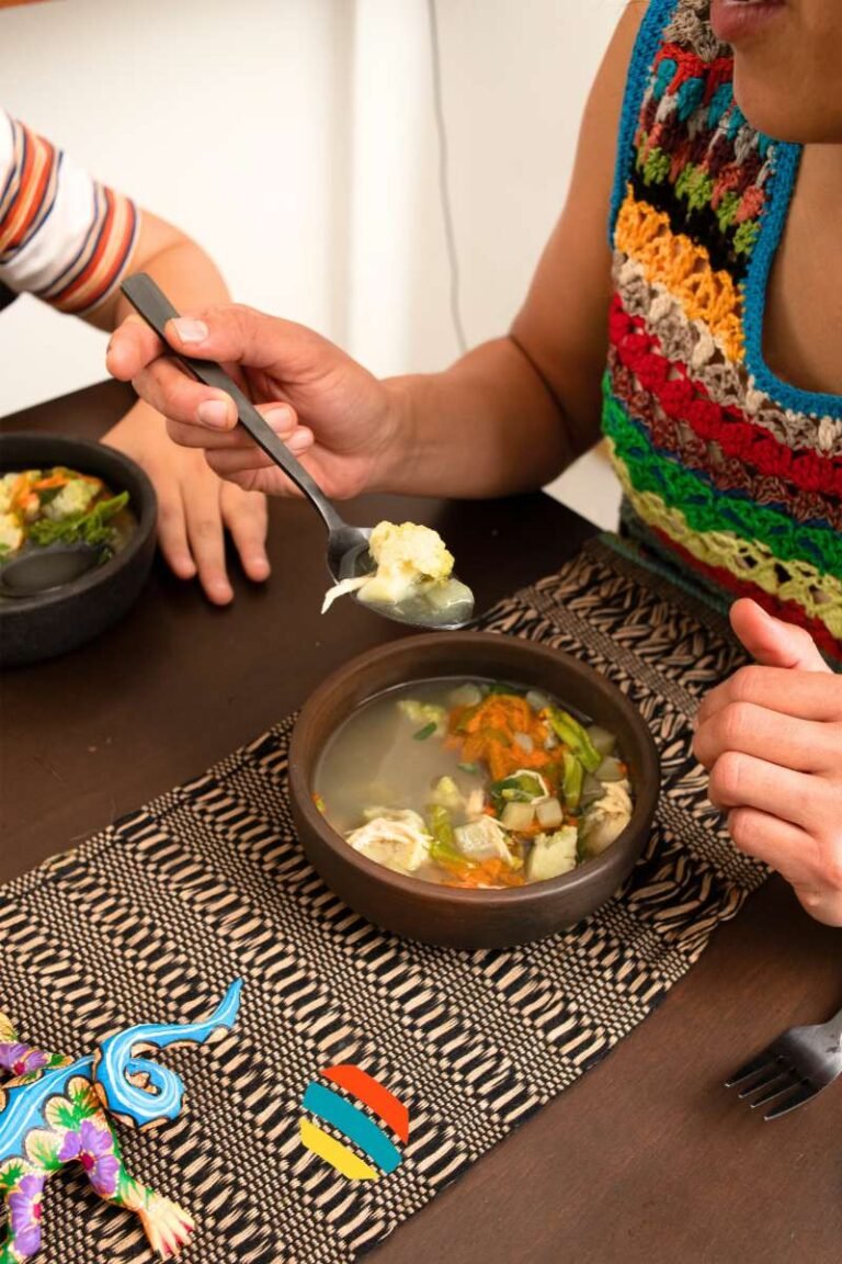 Family enjoying Sopa de Pescado