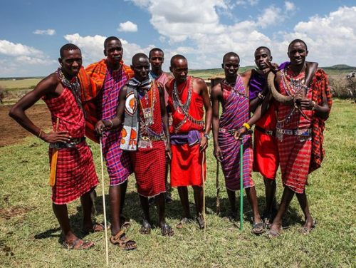 a group of men wearing traditional clothing