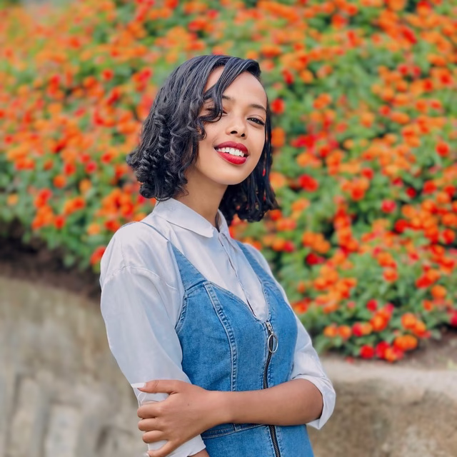 Close-up of Amen, the Ethiopian Travel Influencer, showing her thoughtful expression.