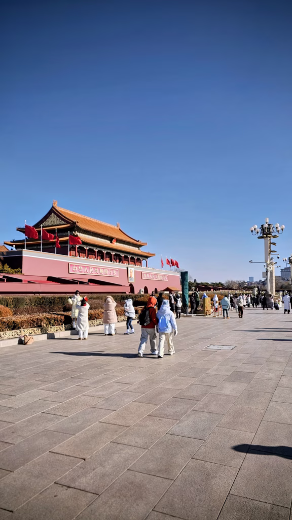 Young Chinese people dressed in heavy winter clothes. Beijing was very cold