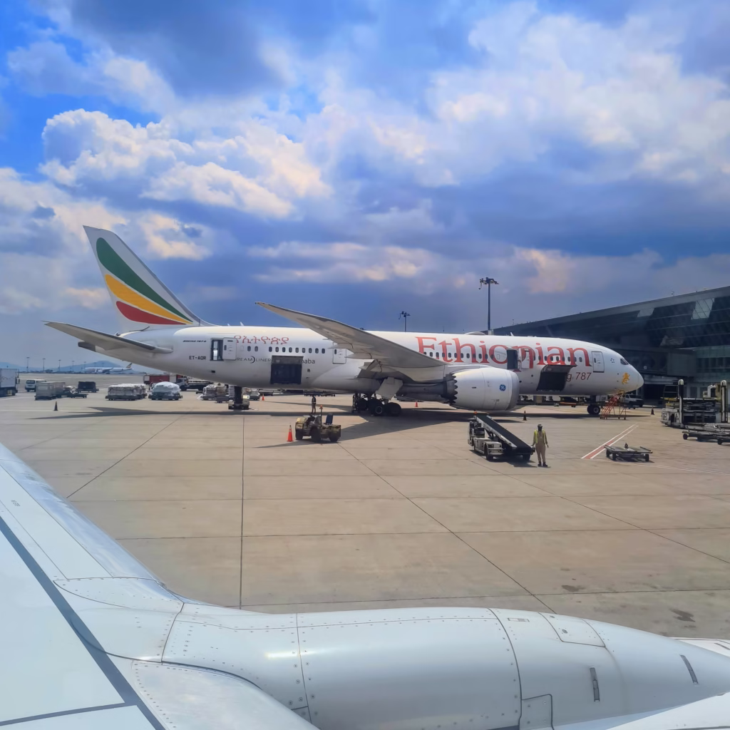 An Ethiopian Airlines plane flying, representing the Africa tourism strategy 2026